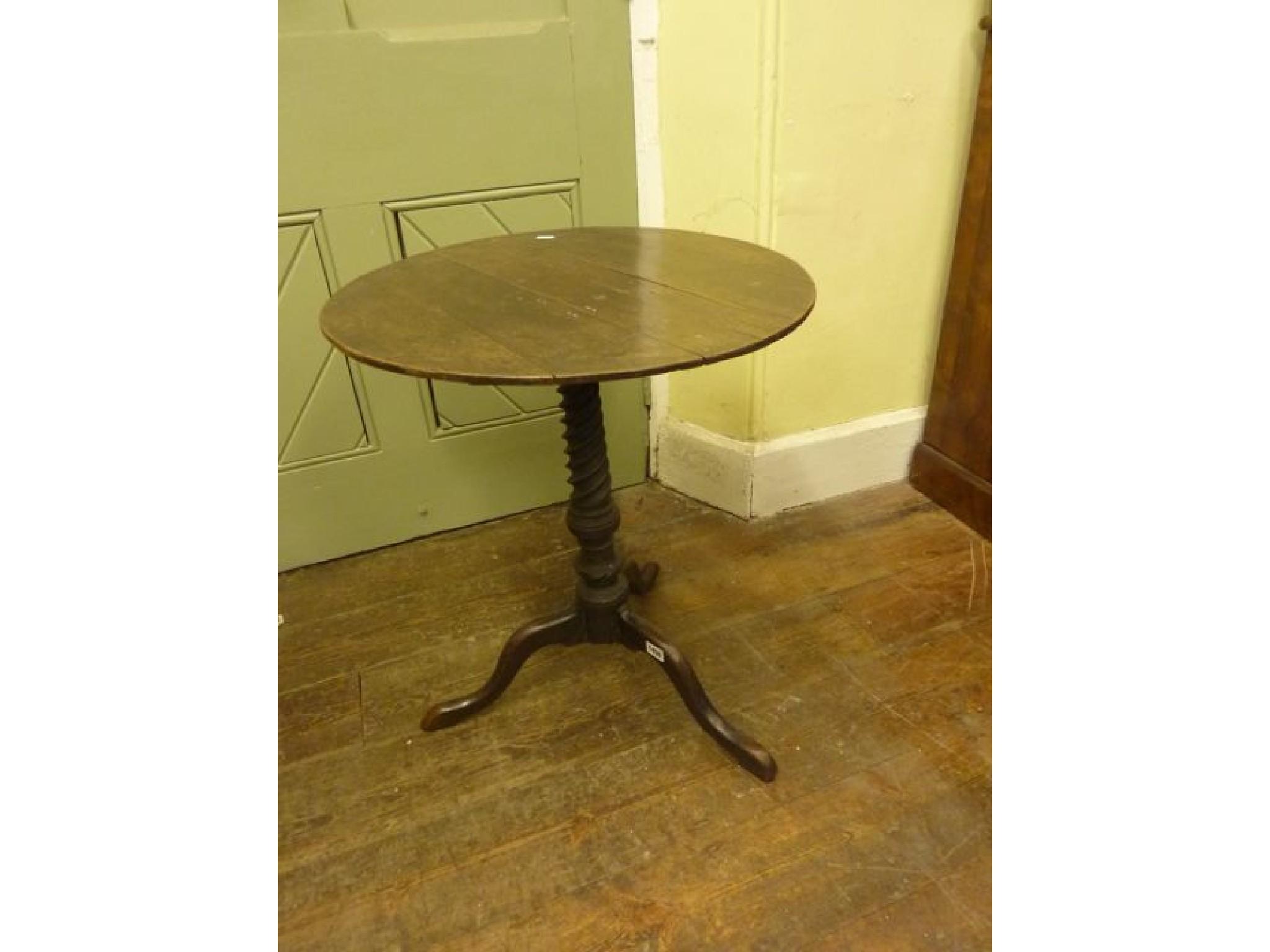 Appraisal: A th century mahogany occasional table the circular associated top