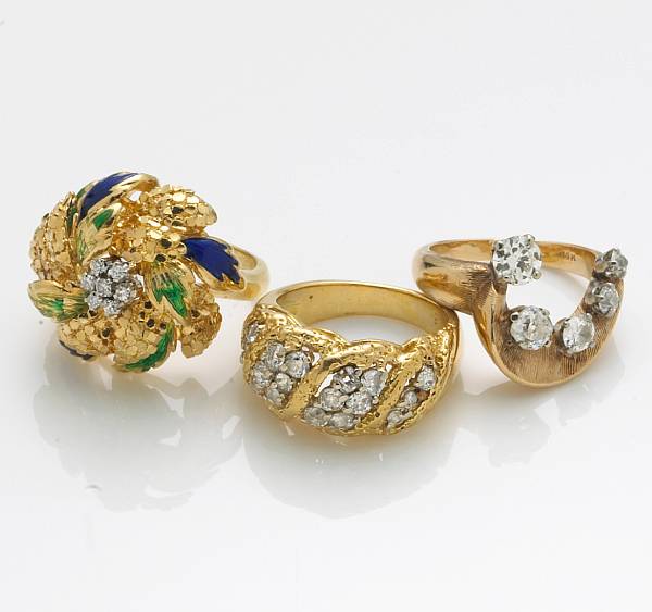 Appraisal: A collection of three diamond enamel k and k gold