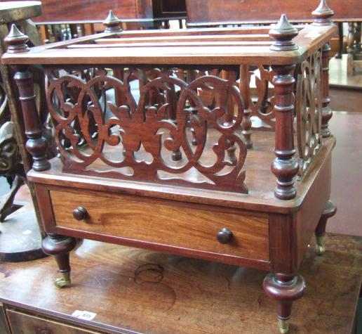 Appraisal: A Victorian style hardwood Canterbury the pierced fretwork sides over