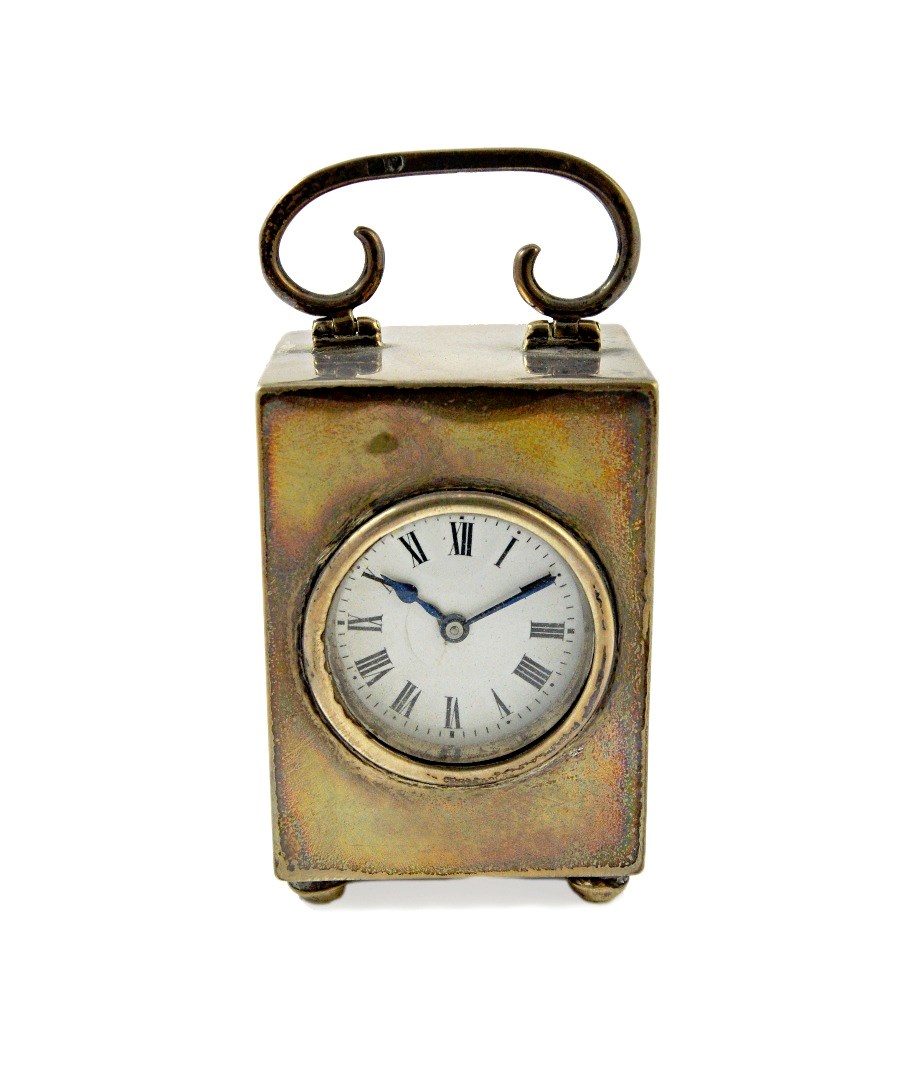 Appraisal: A silver rectangular cased miniature carriage clock time piece with