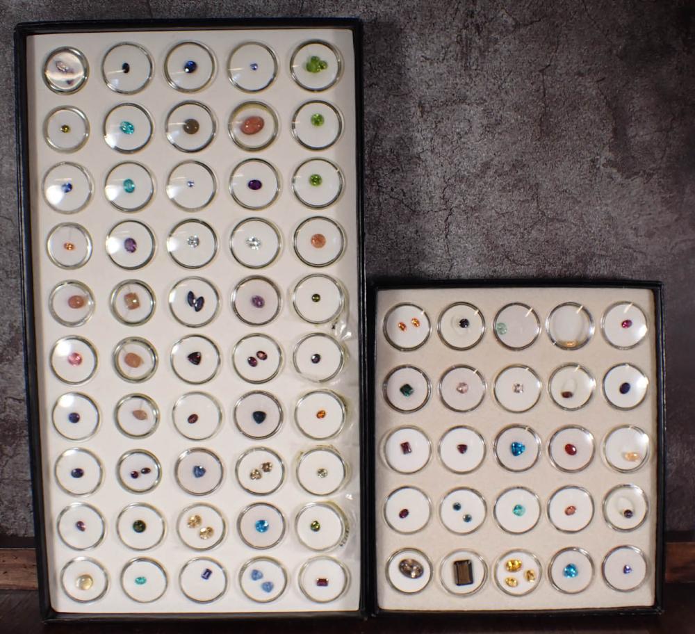 Appraisal: TWO CASED COLLECTIONS OF EIGHTY-NINE UNSET GEMSTONES including sapphire sunstone