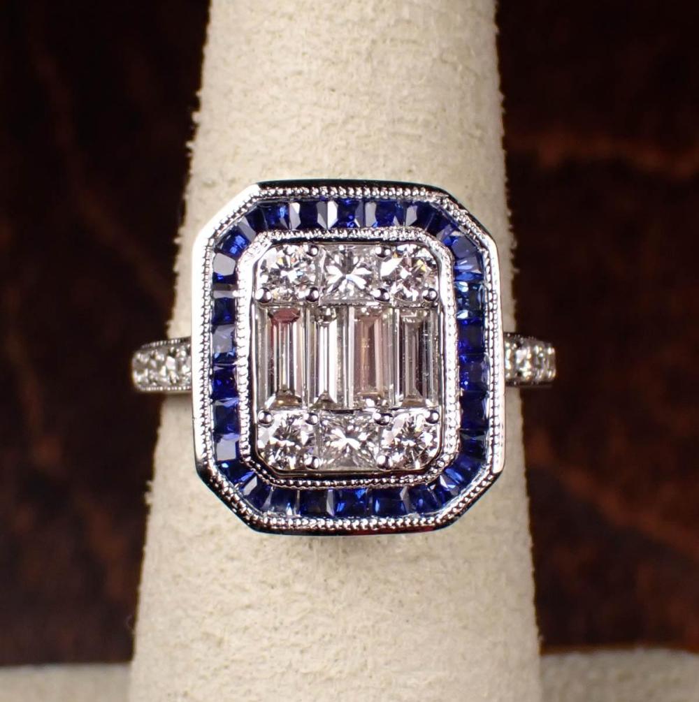 Appraisal: DIAMOND SAPPHIRE AND EIGHTEEN KARAT WHITE GOLD RING The art