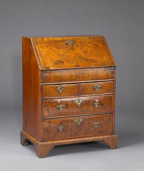 Appraisal: A diminutive George I feather banded walnut desk first quarter