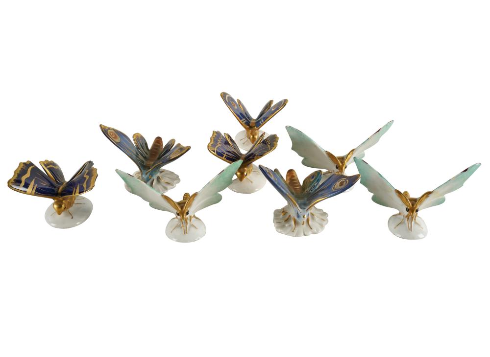 Appraisal: EIGHT CONTINENTAL PORCELAIN BUTTERFLIESeach with blue Volkstedt mark ranging from