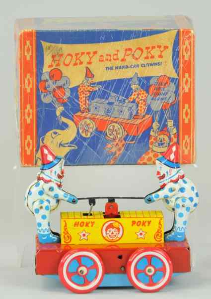 Appraisal: WYANDOTTE HOKY AND POKY CLOWN HANDCAR Boxed example lithographed tin