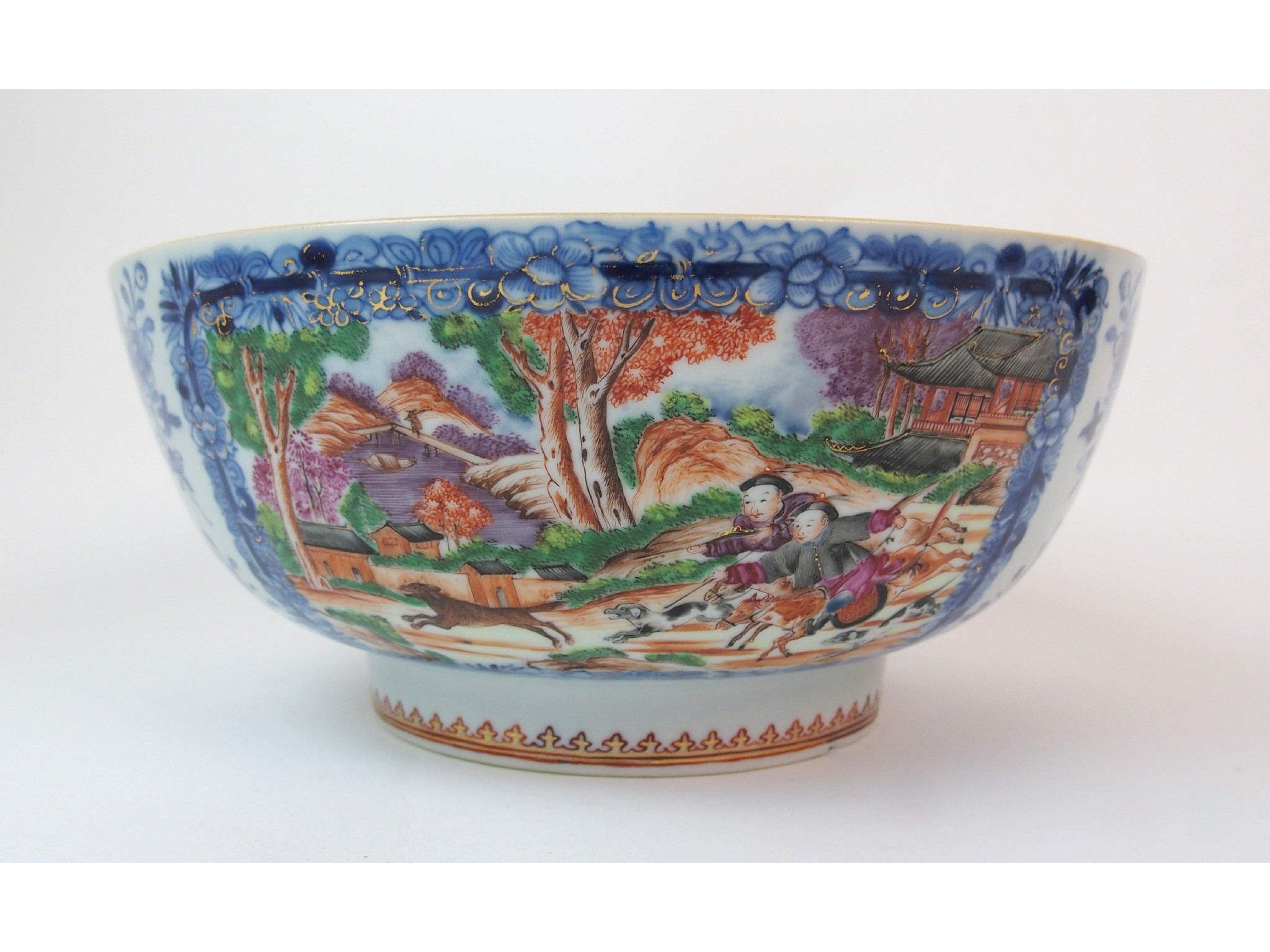 Appraisal: A Chinese export punch bowlpainted with huntsman chasing deer within