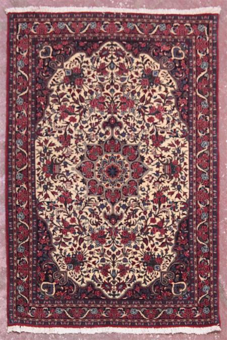 Appraisal: A Qum rug modern the cream field with central indigo