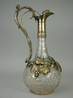 Appraisal: A cut glass silver plated claret jug early th century