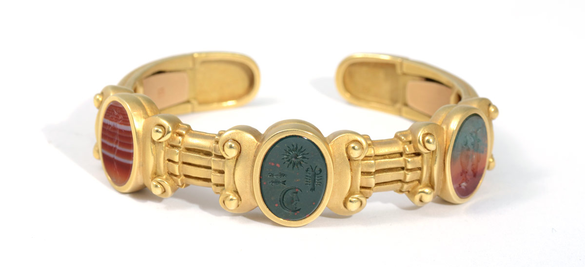 Appraisal: KIESELSTEIN-CORD K INTAGLIO BRACELET K yellow gold cuff bracelet with