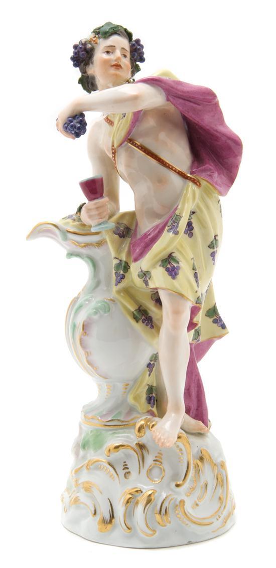 Appraisal: A Meissen Porcelain Figure depicting a Bacchic scene having crossed