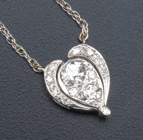 Appraisal: Diamond conversion necklace in k wg ca Hinged heart shape