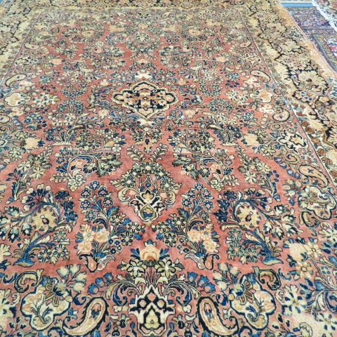 Appraisal: Sarouk Persian Handmade Room Size Rug elegant floral designs light