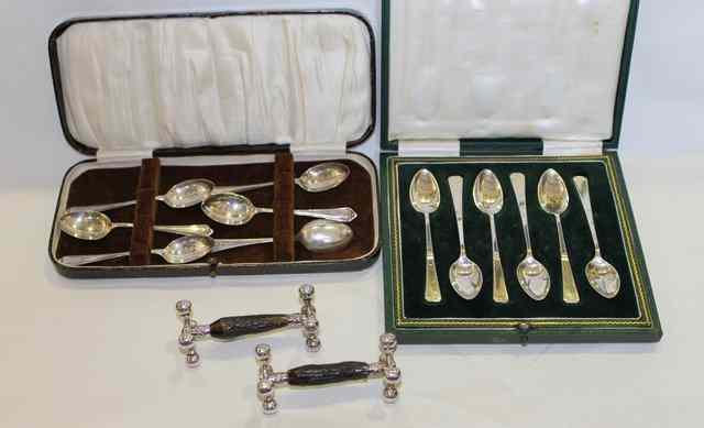 Appraisal: A CASE OF SIX SILVER TEA SPOONS of stylised form