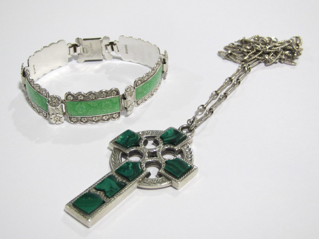 Appraisal: A silver and green guilloche bracelet with floriate rectangular plaques