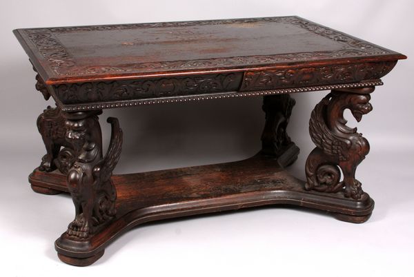 Appraisal: Heavily carved Chinese table with dragon motif legs h x