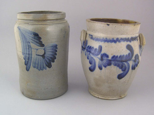 Appraisal: Two stoneware crocks th c with cobalt floral decoration h