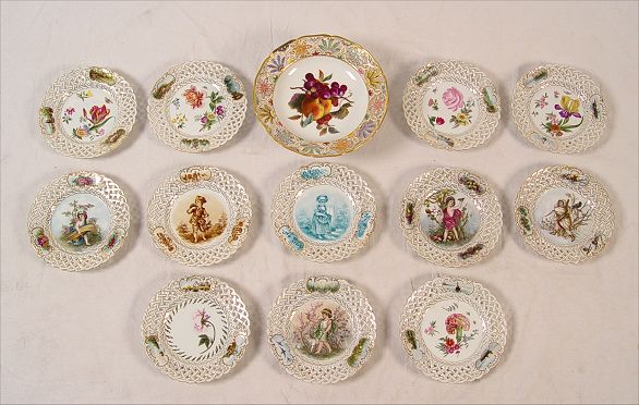 Appraisal: BERLIN PORCELAIN RETICULATED PLATES DATED Each centering a different handpainted