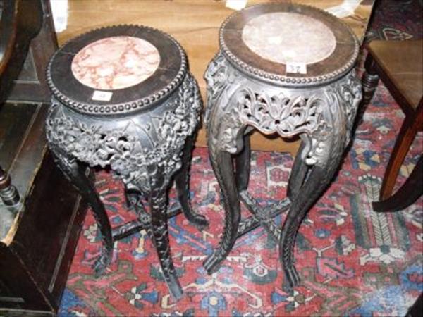 Appraisal: Two Chinese Huang Huaili plant stands each inset with marble