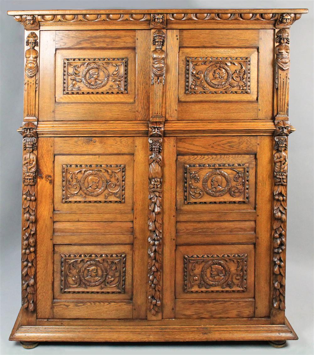 Appraisal: TWO RENAISSANCE REVIVAL CARVED OAK CABINETS each with an egg