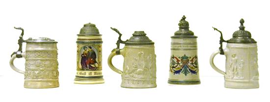 Appraisal: Five steins including half liter stein with long-eared Green Man