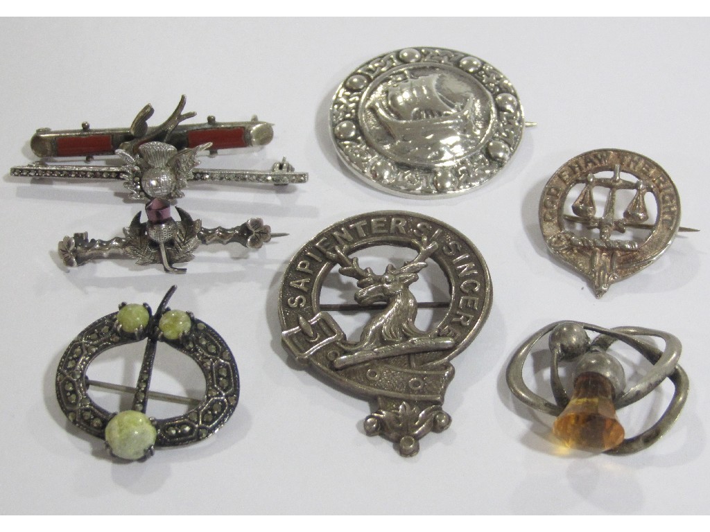 Appraisal: Lot of white metal and silver brooches to include clan