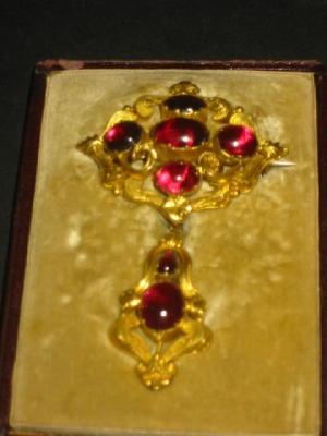 Appraisal: A VICTORIAN GARNET BROOCH the main body set with five