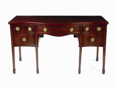 Appraisal: A George III mahogany serpentine front sideboard with the central