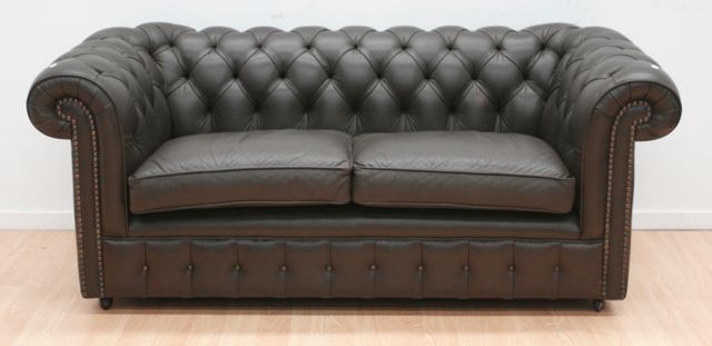 Appraisal: Two Chesterfield style two seater sofas