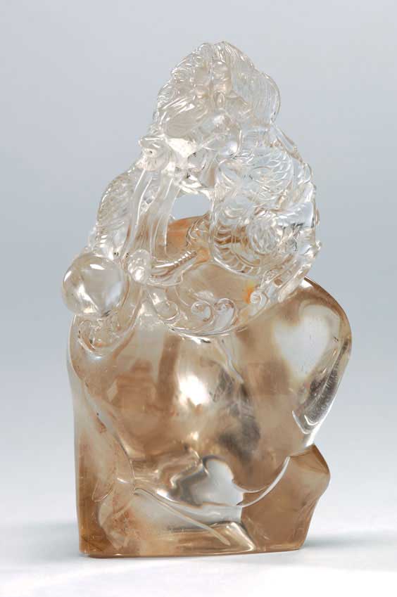 Appraisal: CARVED ROCK CRYSTAL DRAGON Well carved and detailed Chinese rock