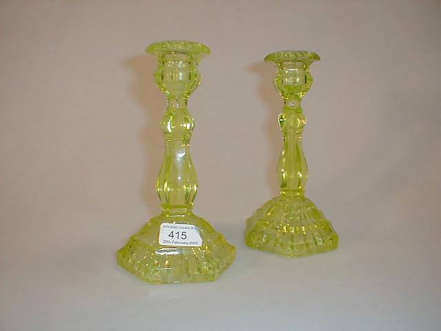 Appraisal: A pair of Victorian lime green pressed glass candlesticks