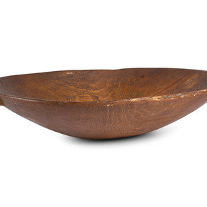 Appraisal: A Carved Wood Dough Bowl th Century in stained pine