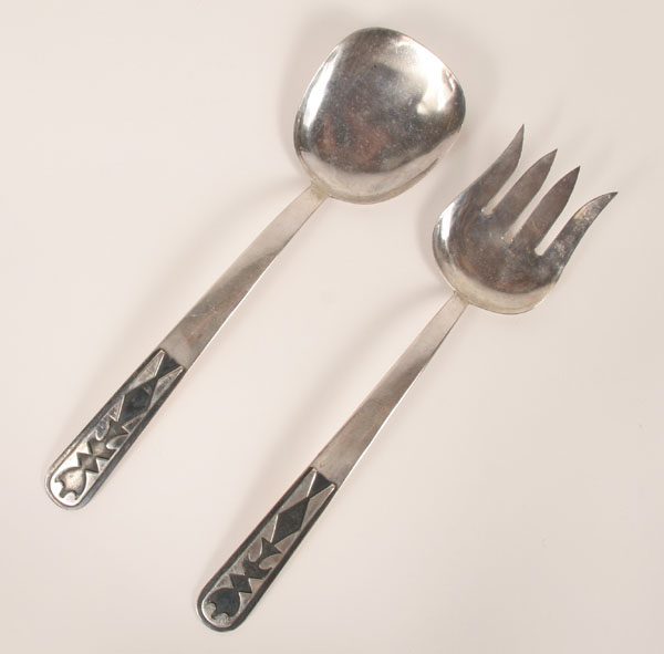 Appraisal: Native American salad set spoon and fork with raised geometric