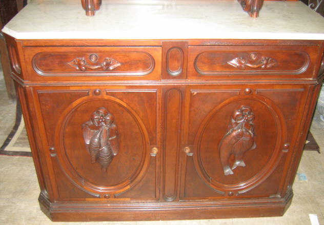 Appraisal: AMERICAN RENAISSANCE REVIVAL WALNUT SIDEBOARD The tall arched back centers