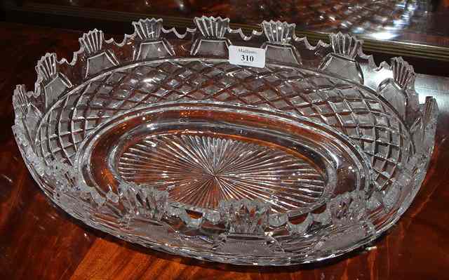 Appraisal: AN OVAL CUT GLASS BOWL with castellated rim wide