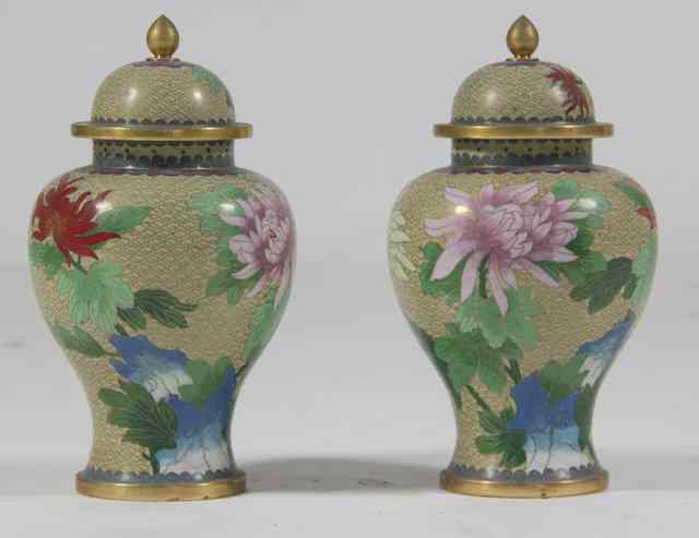 Appraisal: A pair of th Century cloisonn jars and covers cm