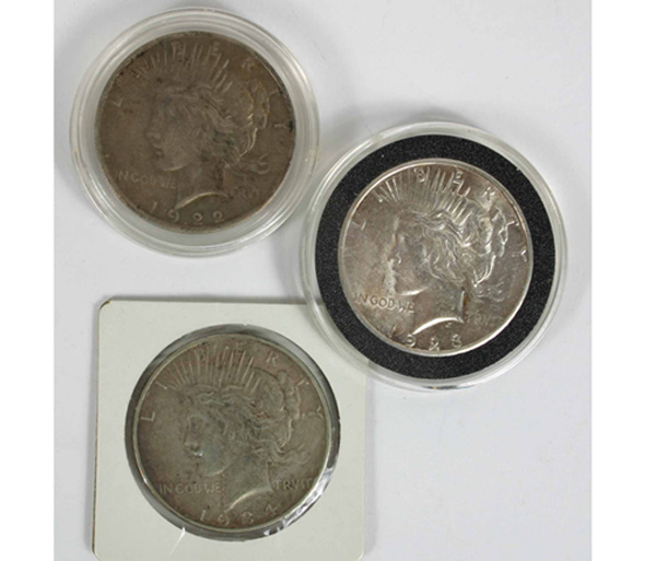 Appraisal: Three US Silver Peace Dollars