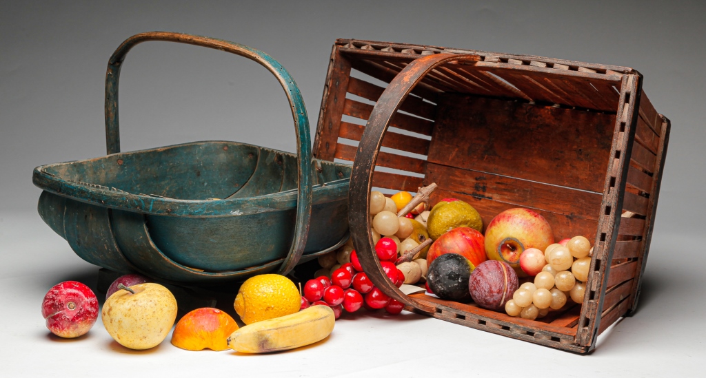 Appraisal: TWO BASKETS WITH STONE FRUIT Twentieth century Approximately twenty five