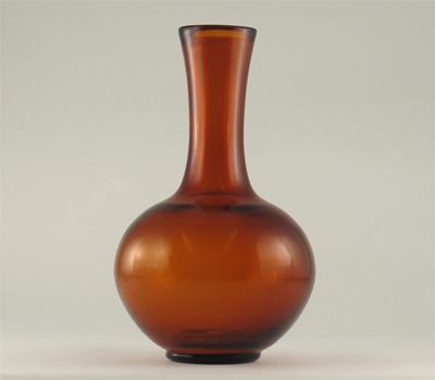 Appraisal: A Chinese Beijing amber coloured glass bottle vase the base