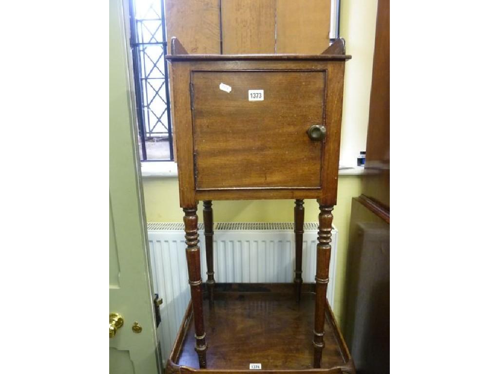 Appraisal: A th century mahogany pot cupboard with raised three quarter