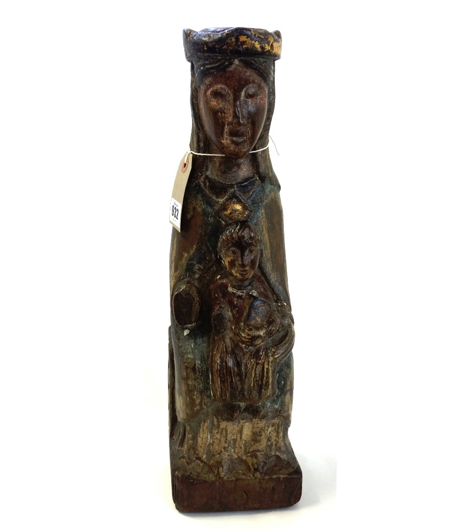 Appraisal: A polychrome painted carved wood group of the 'Virgin child'