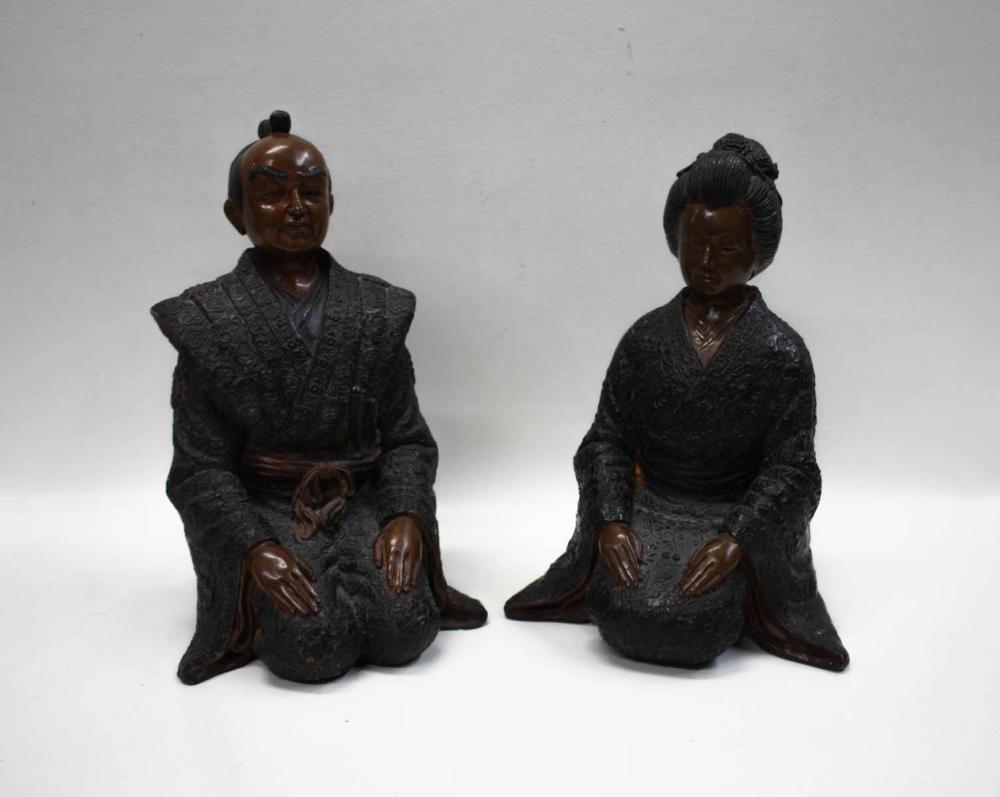 Appraisal: PAIR OF JAPANESE POLYCHROME FIGURAL SCULPTURES depicting a seated man