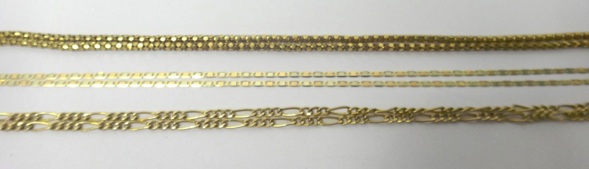 Appraisal: A ct gold figaro link neckchain on a sprung hook