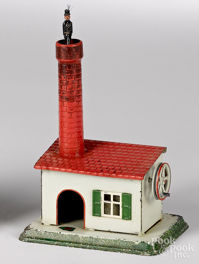 Appraisal: Doll painted tin chimney sweep steam toy accessory Doll painted