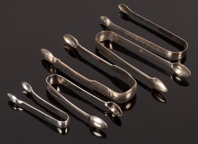 Appraisal: A pair of George III bright cut silver sugar tongs