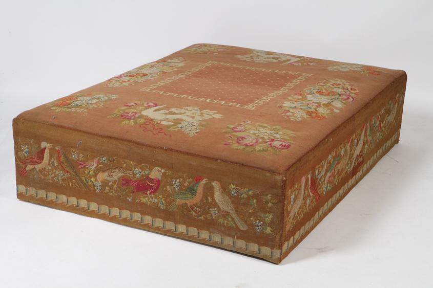 Appraisal: A LARGE VICTORIAN NEEDLEWORK OTTOMAN the rectangular top worked with