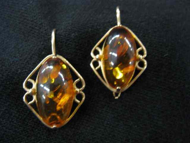 Appraisal: Amber Earrings cabochon stones with k yellow gold wire style