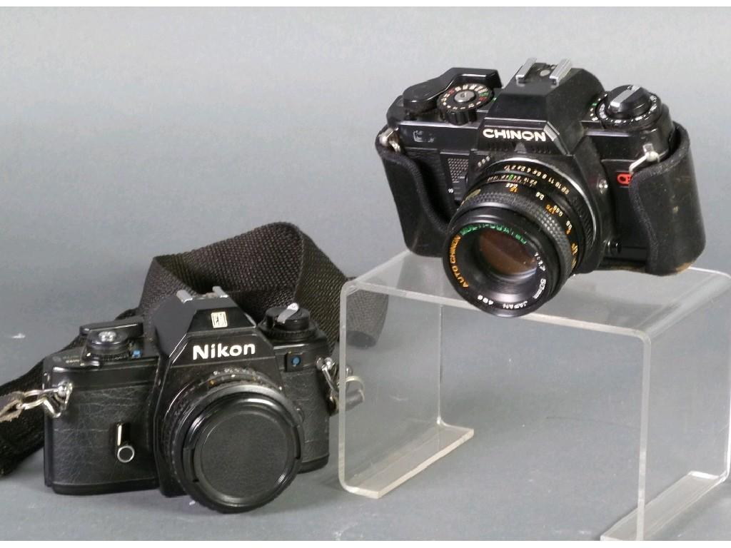 Appraisal: NIKON EM mm SLR ROLL FILM CAMERA together with a