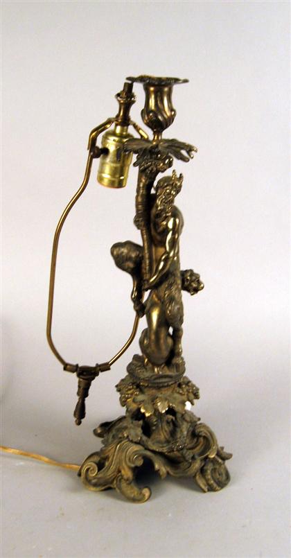 Appraisal: French bronze satyr lamp late th century Formerly a candelabra