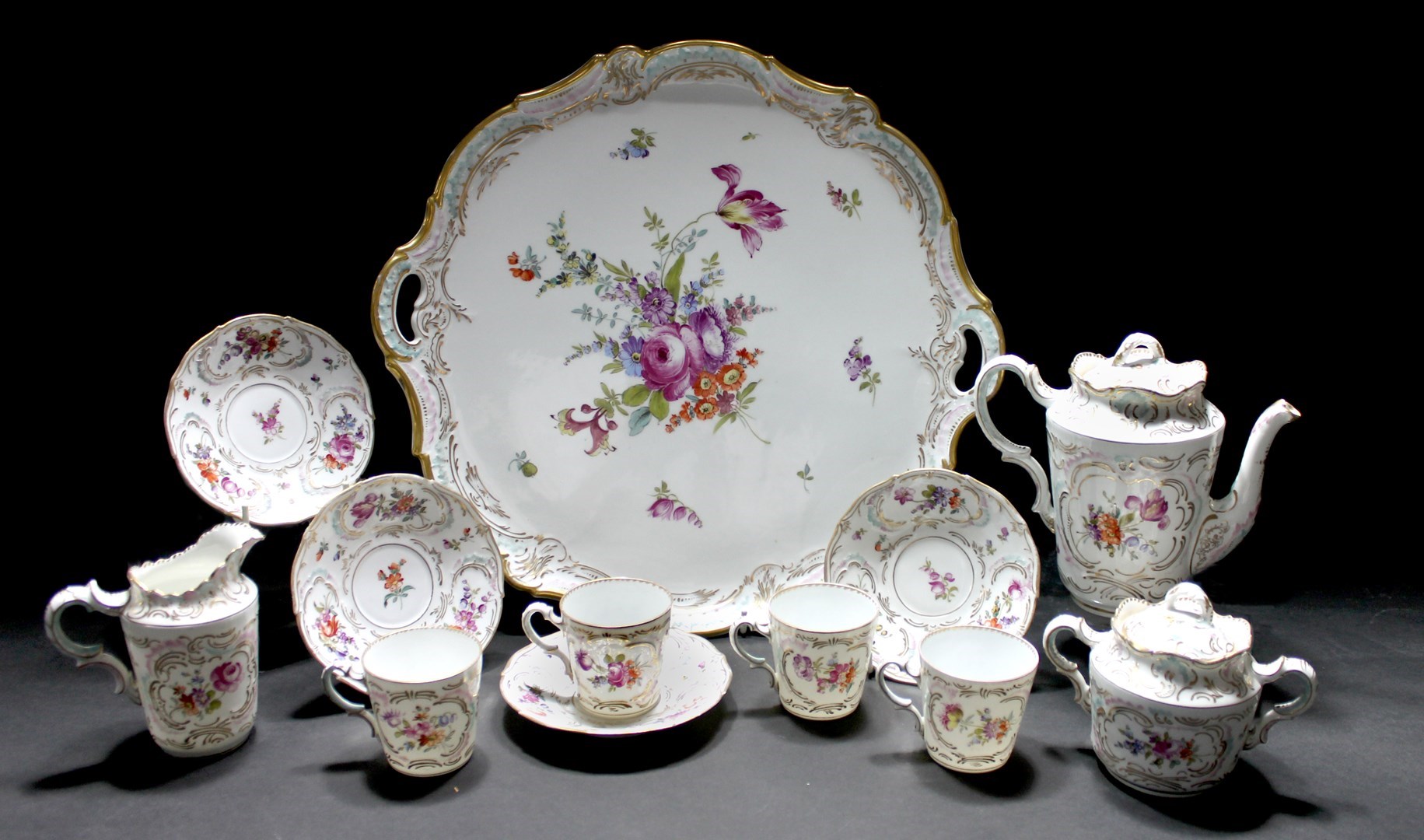 Appraisal: A Continental Dresden style tea service early-mid th century decorated