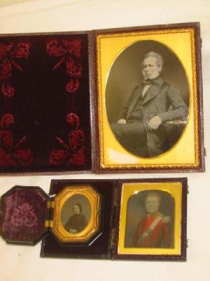 Appraisal: A VICTORIAN OVERPAINTED PHOTOGRAPH depicting a military officer in red